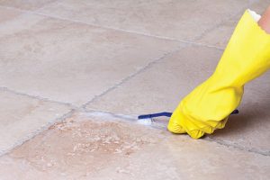 Remove oil-based paint from ceramic tile